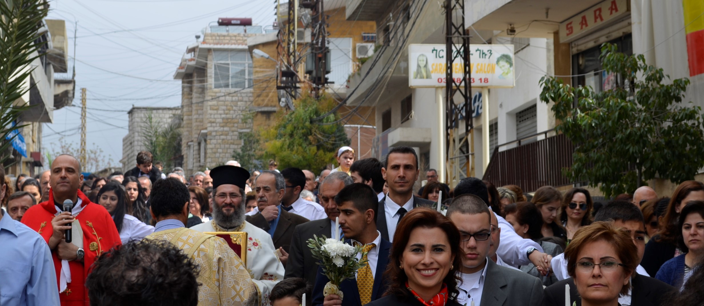 Christians in the West follow the Gregorian, while the Eastern Orthodox Christians follow the Julian calendar. Sometimes, the Easter dates coincide. The parishioners of Mar Elias Church and those of the Maronite Parish of Beit-Mery met half way on the main village street to walk together in solidarity during Holy week 2014. In 2014 Easter Sunday coincided on April 20 and was celebrated by both the Eastern and Western Christian traditions on the same day.
